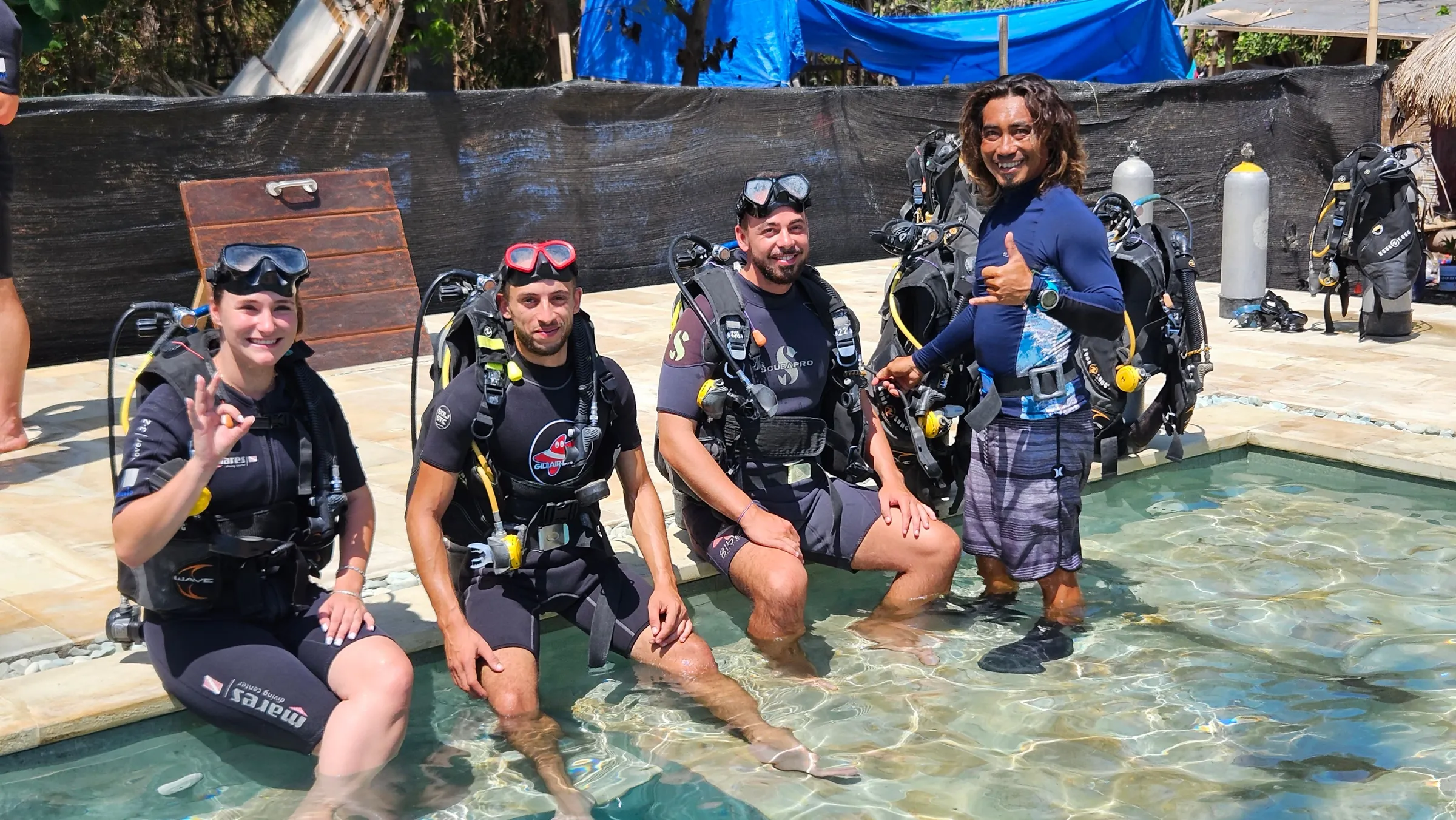 Buddy team smiling at poolside