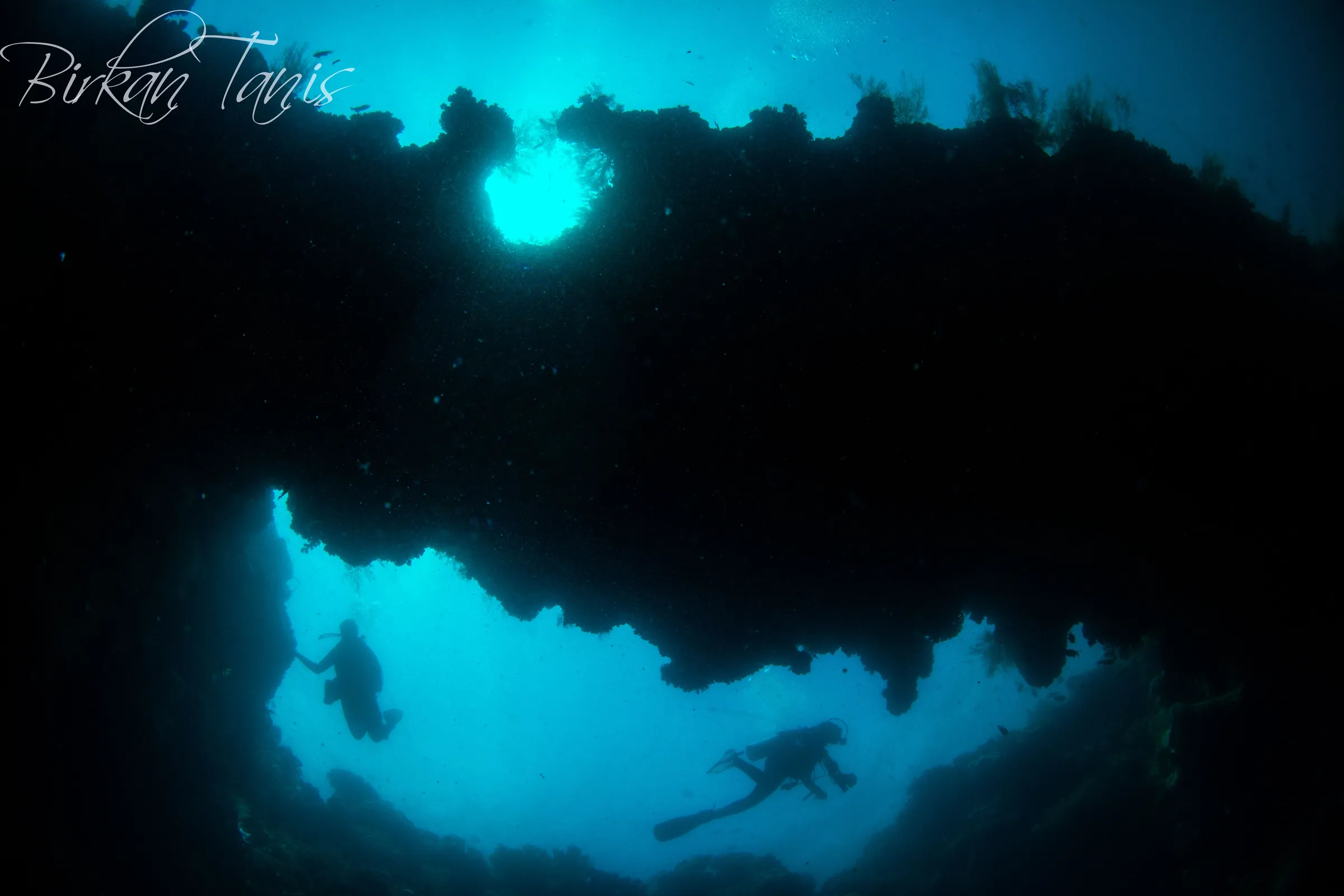 Diver exploring swim-through