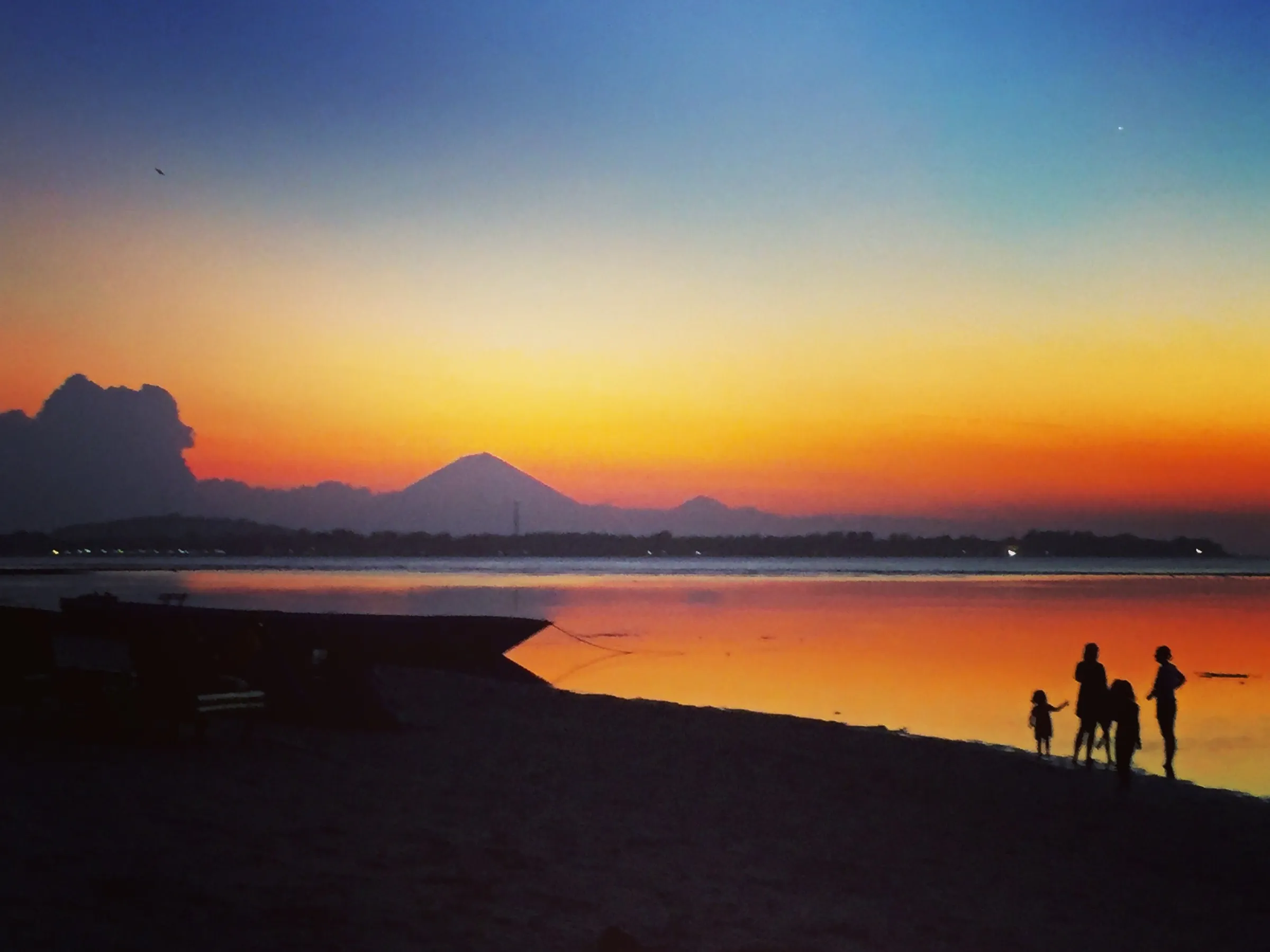 Sunset with volcano on horizon