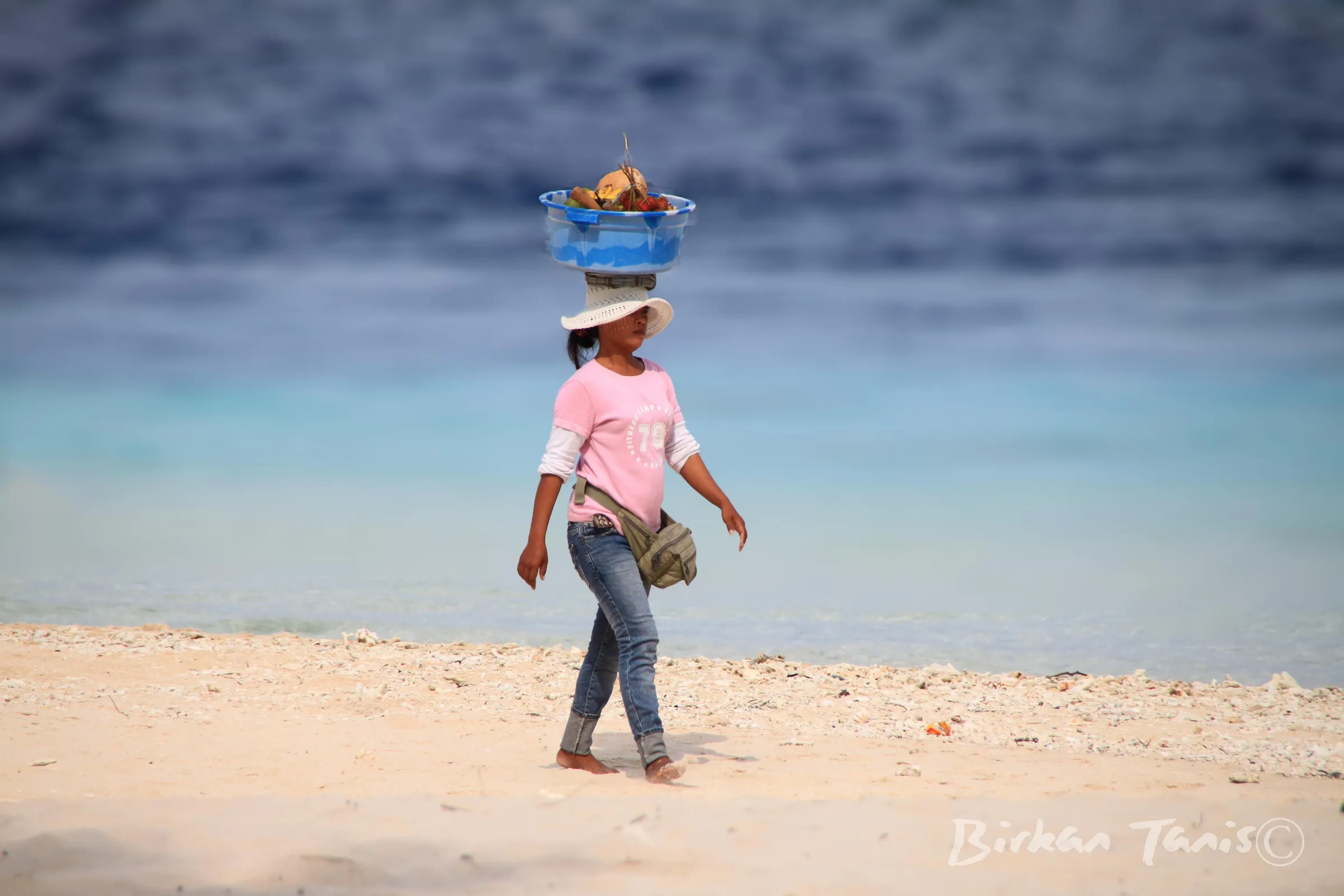 Local woman with basket on head
