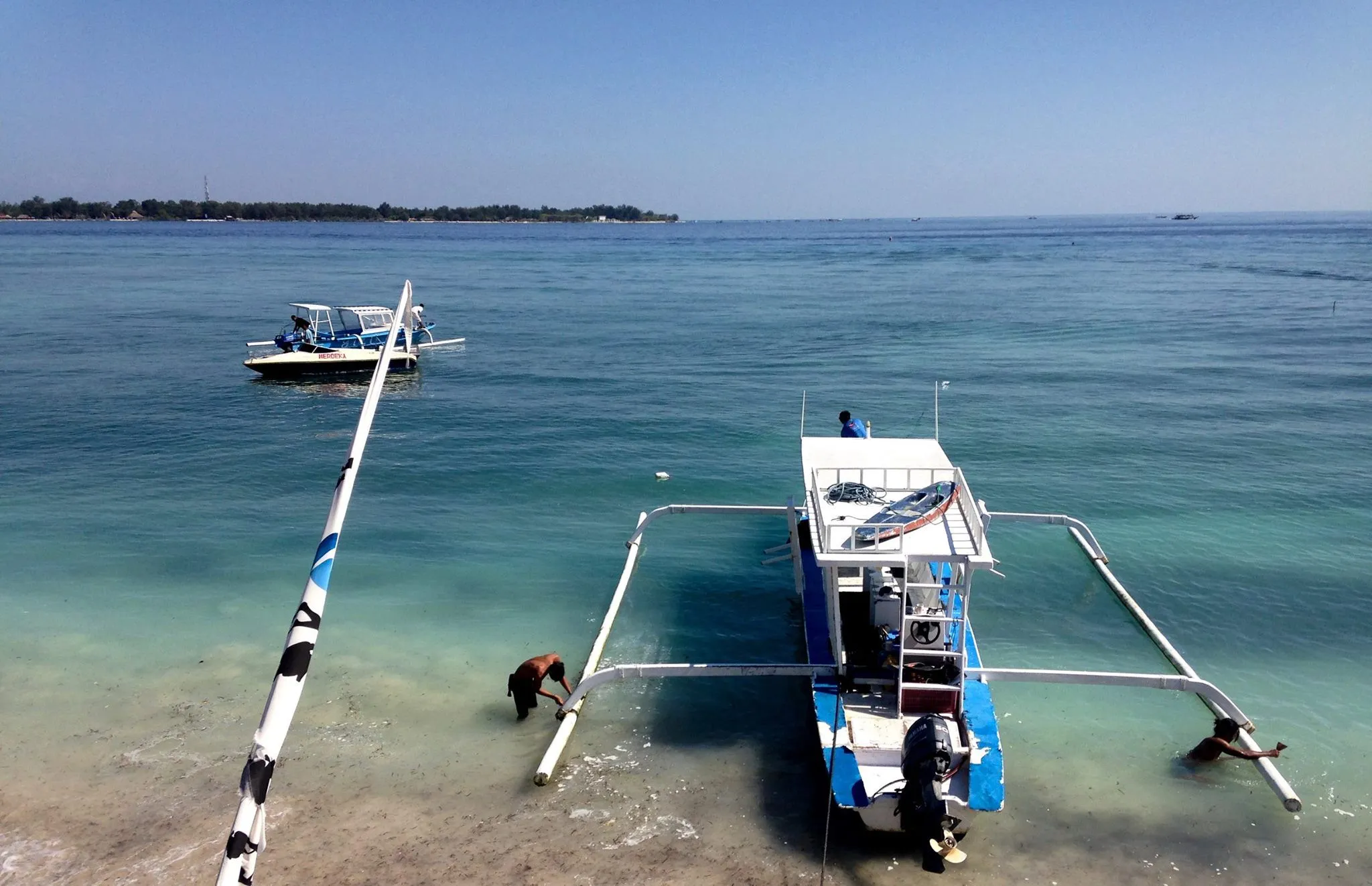 Boat moored offshore