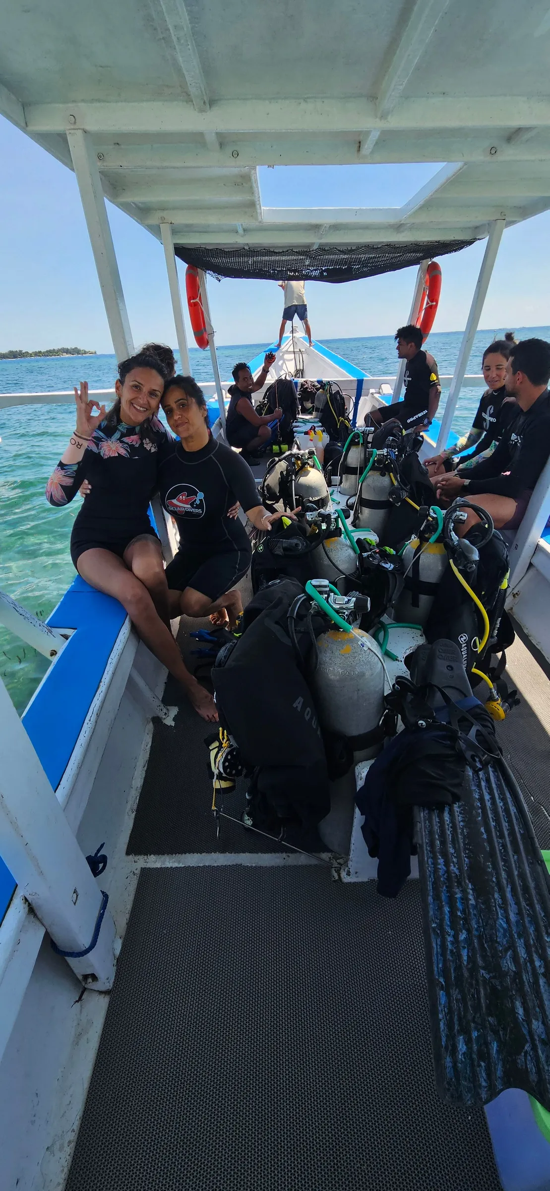 Group on dive boat ready to go