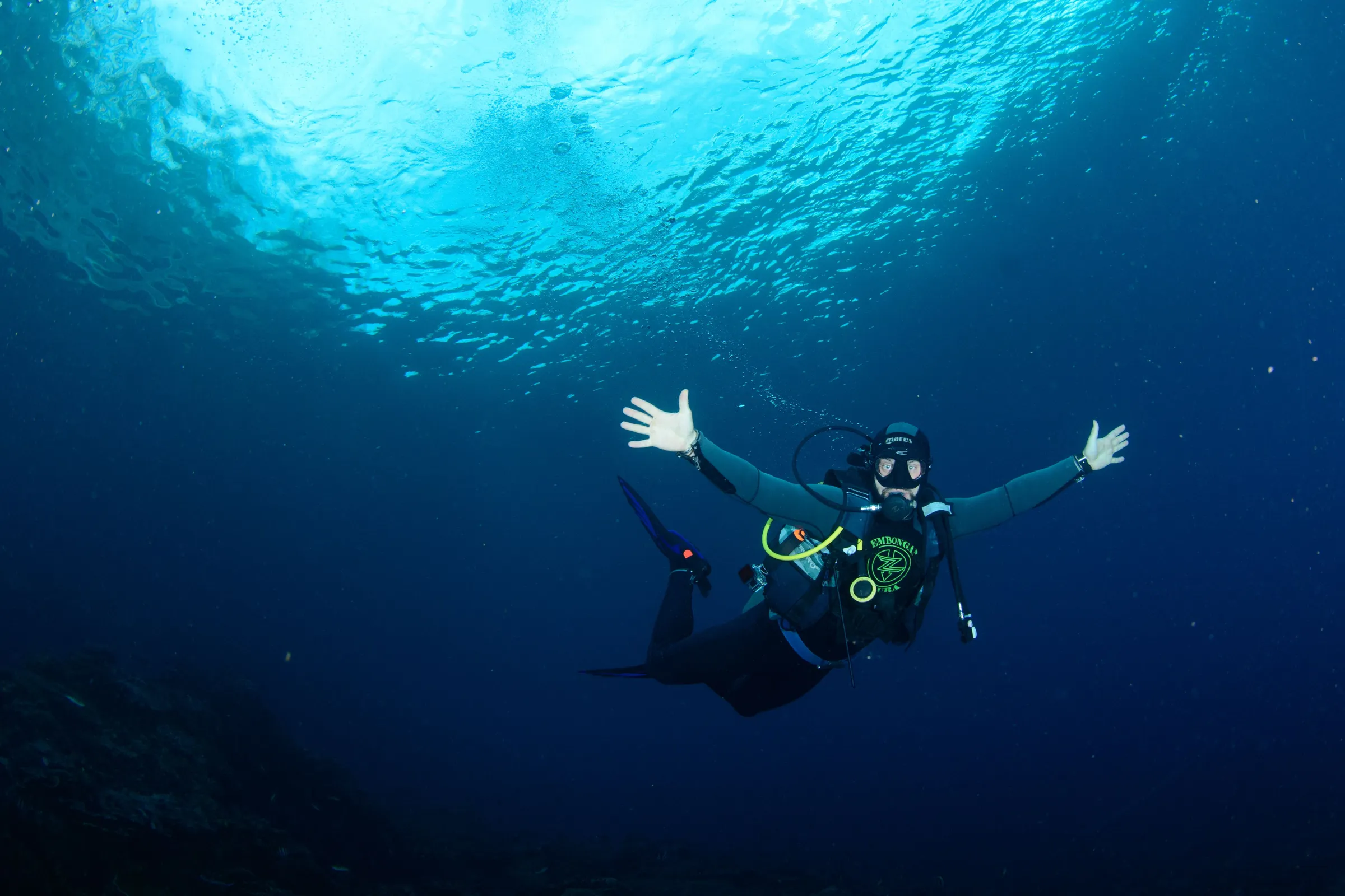 Diver in clear blue water