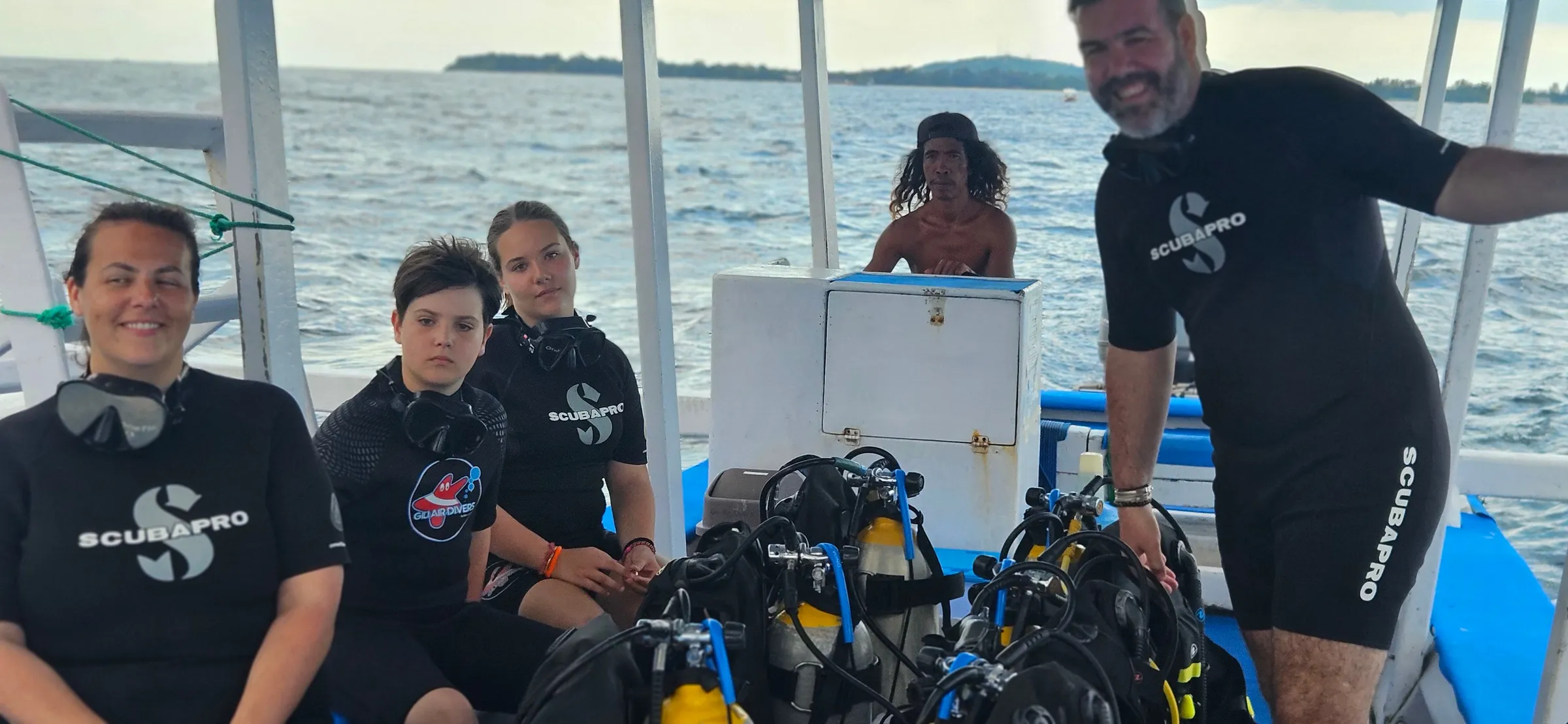 Instructor and student with gear on boat